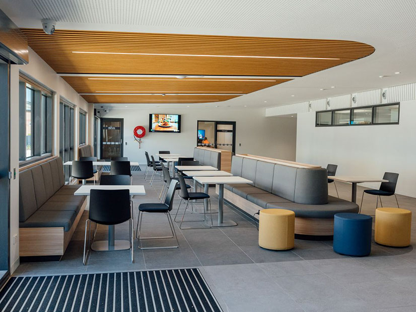 Indoor area with seats and tables at Fawkner Leisure Centre.